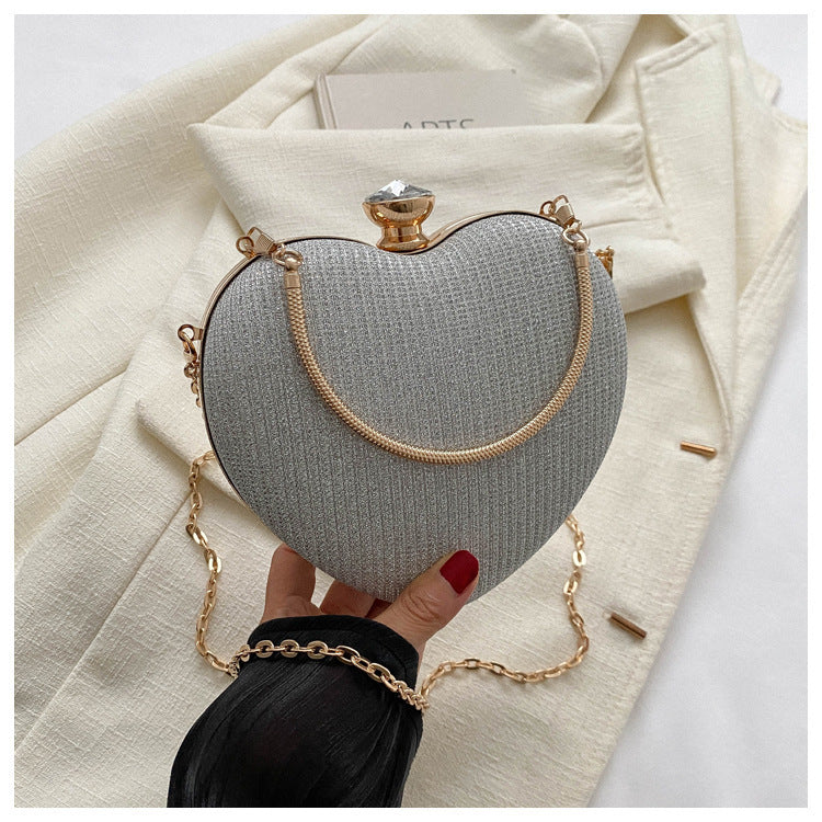 Shiny Heart-Shaped Metal Clutch Bag with Chain Shoulder Strap